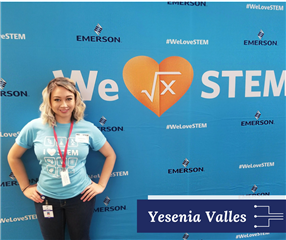 Yesenia Valles standing in front of Emerson We <3 STEM.