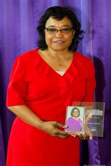 Pamela Jackson holding her MIBW award.
