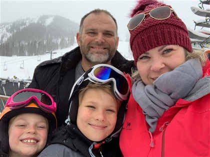 Kishia with her family on a ski trip.